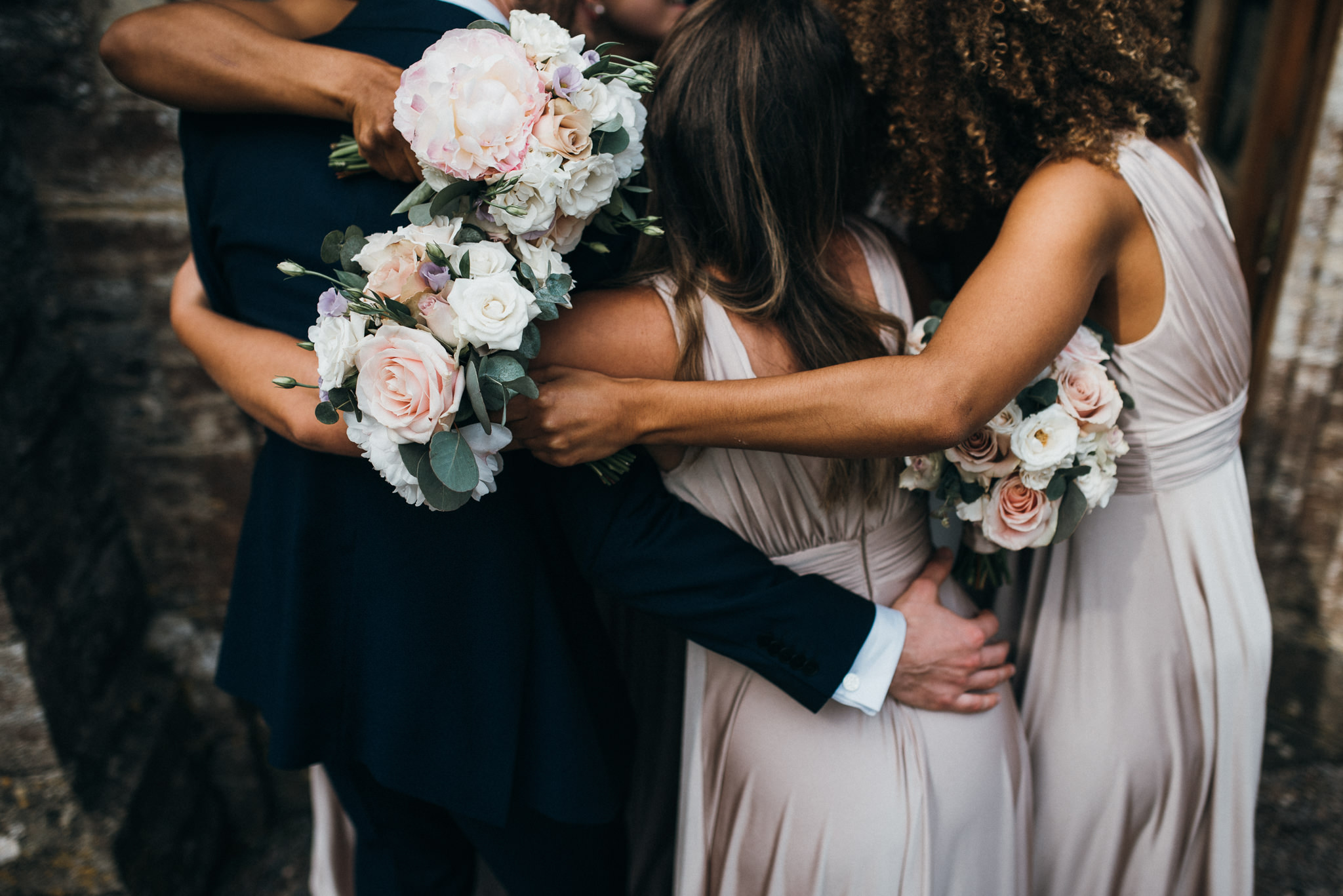 group hug from bridesmaids 
