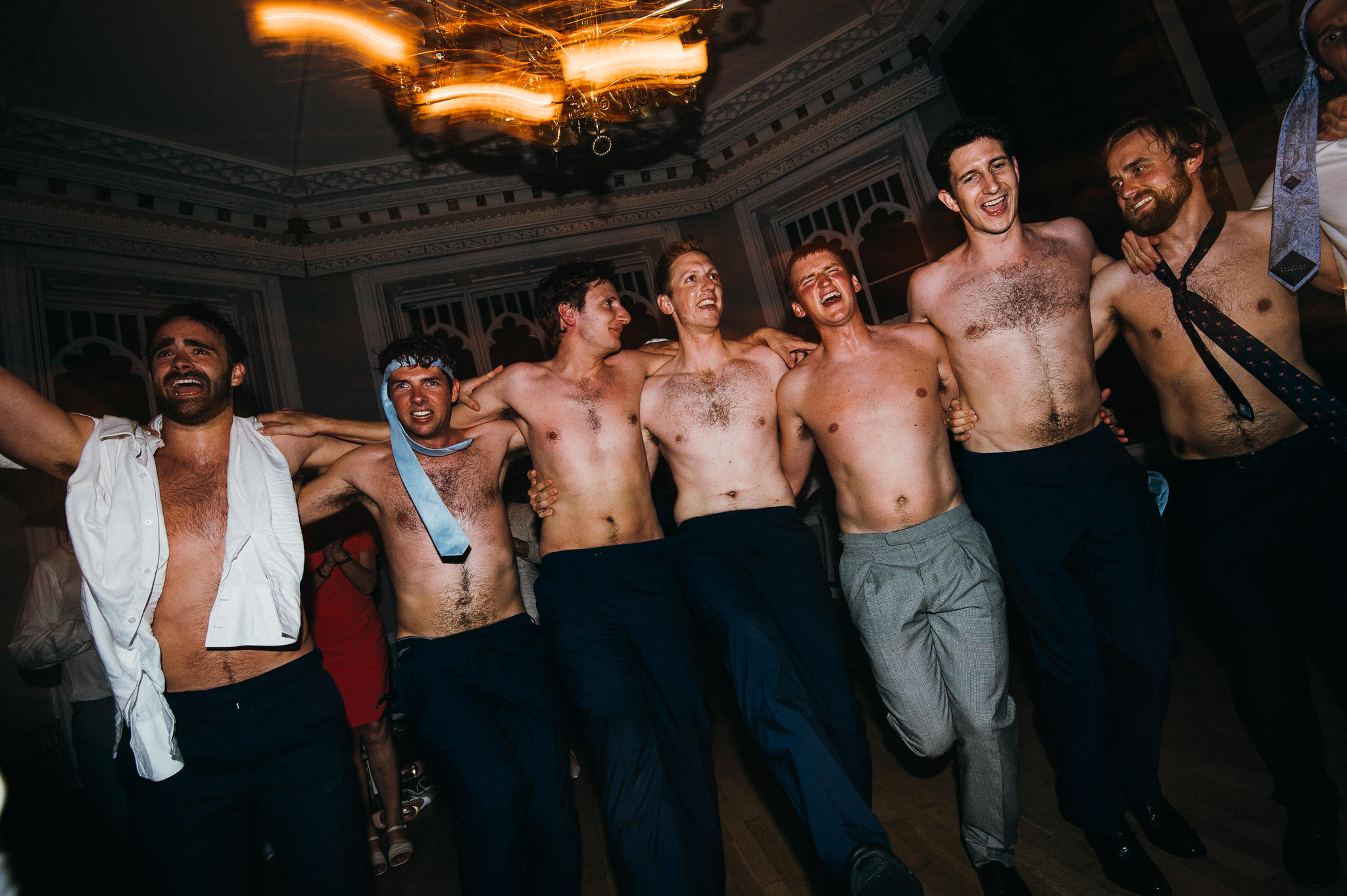 Topless guys at wedding 