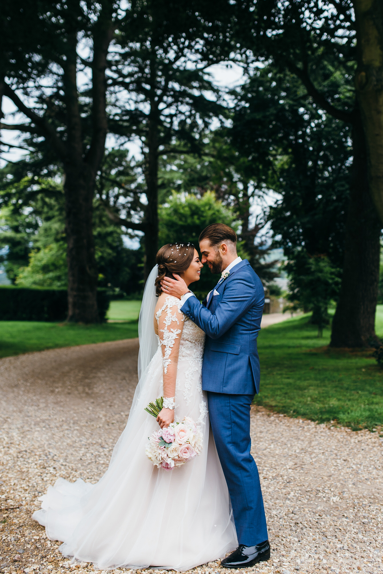 Bride and Groom embrace at Coombe Lodge 