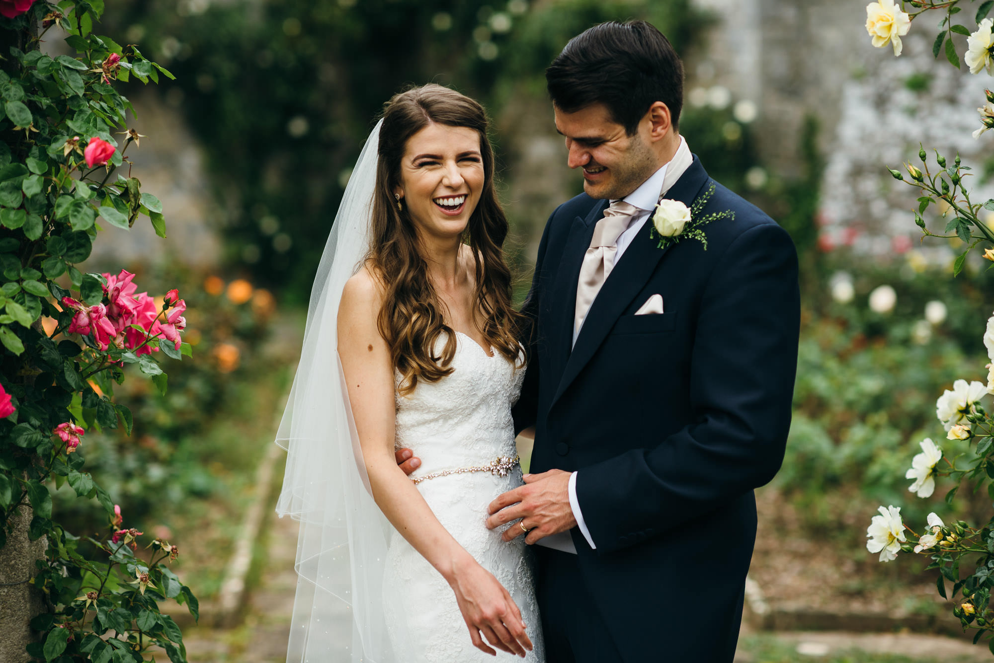 Bride and groom at St donats castle Rose Garden