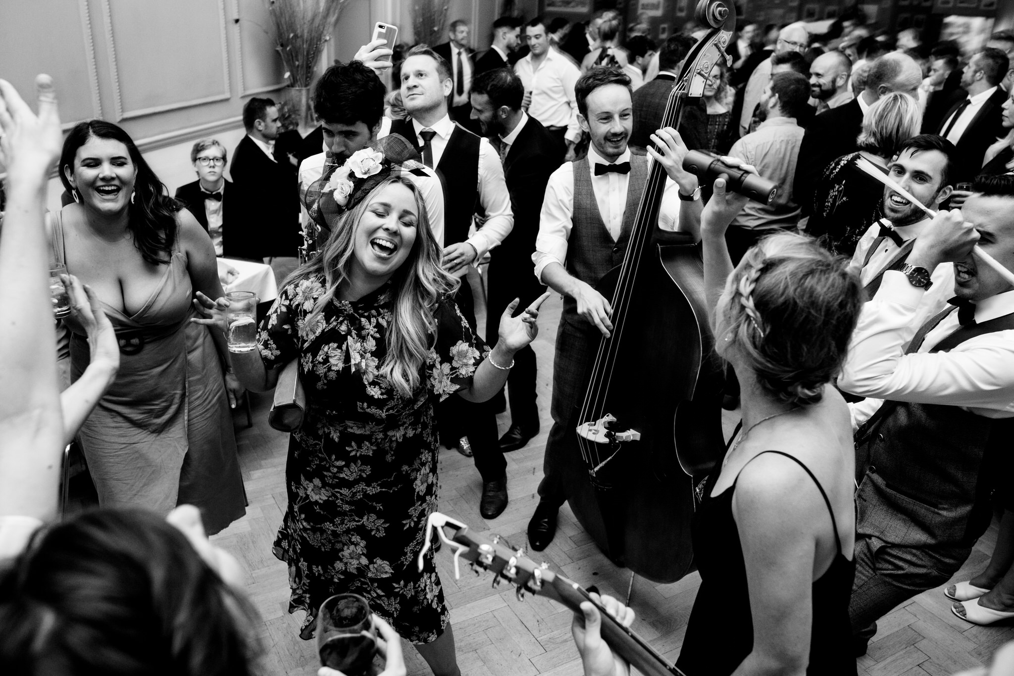 Guest dance to the Travelling Hands at a wedding at Assembly Rooms Bath