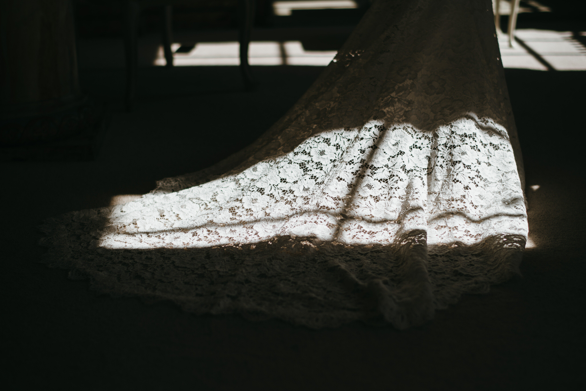 Sunlight catches the brides dress at Gosfield hall