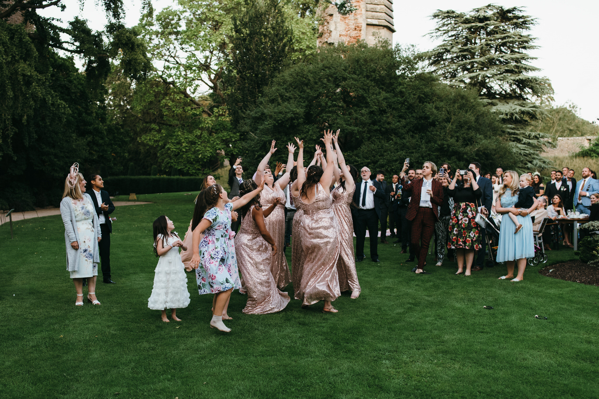 Bride throws the bouquet at Bishops palace 