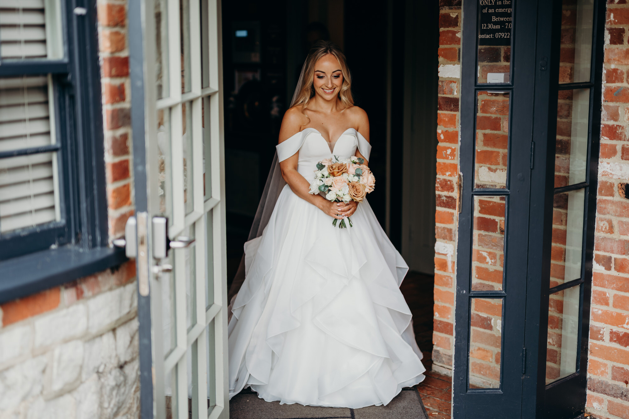 Bride walks outside for first look at Bury Court