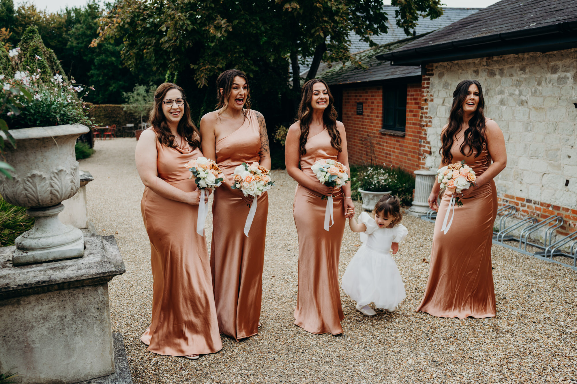 Bridesmaids see bride fro first time at Bury Court