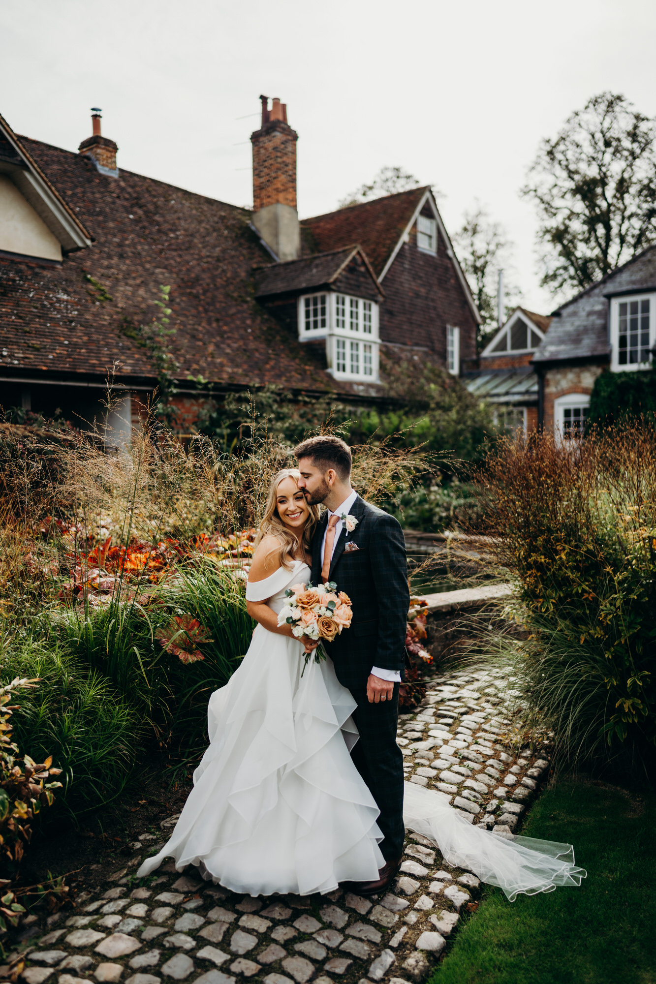 Autumnal Bride and groom wedding portraits at Bury Court 