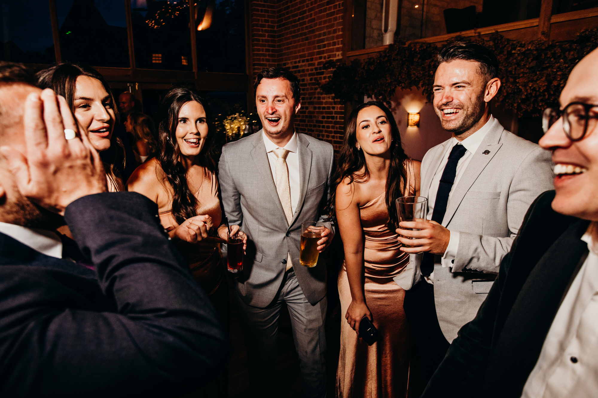 Guest amazed at Tommy Knight magic at Bury Court Wedding 