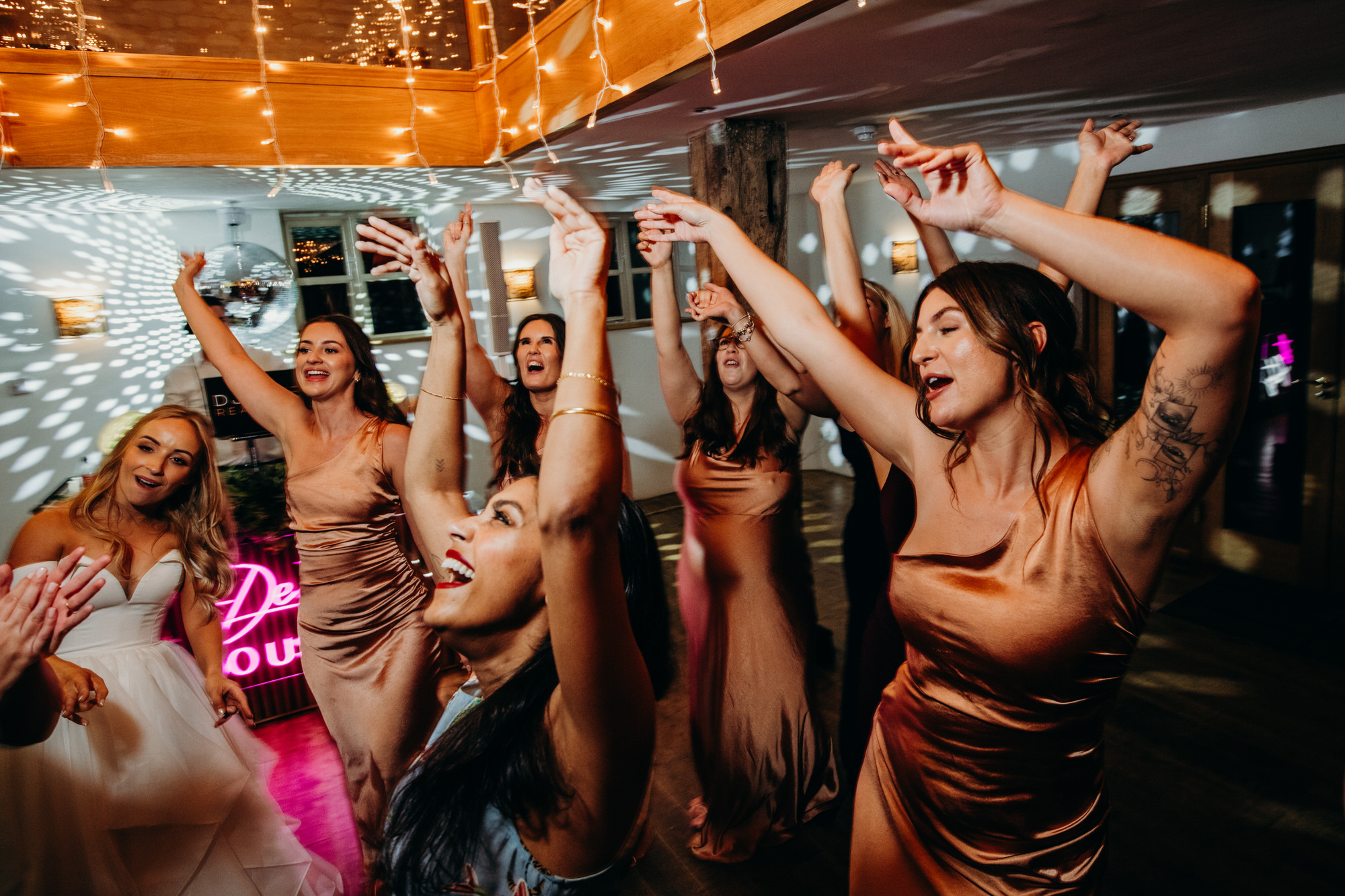 Guests enjoy the music at a Bury Court wedding 