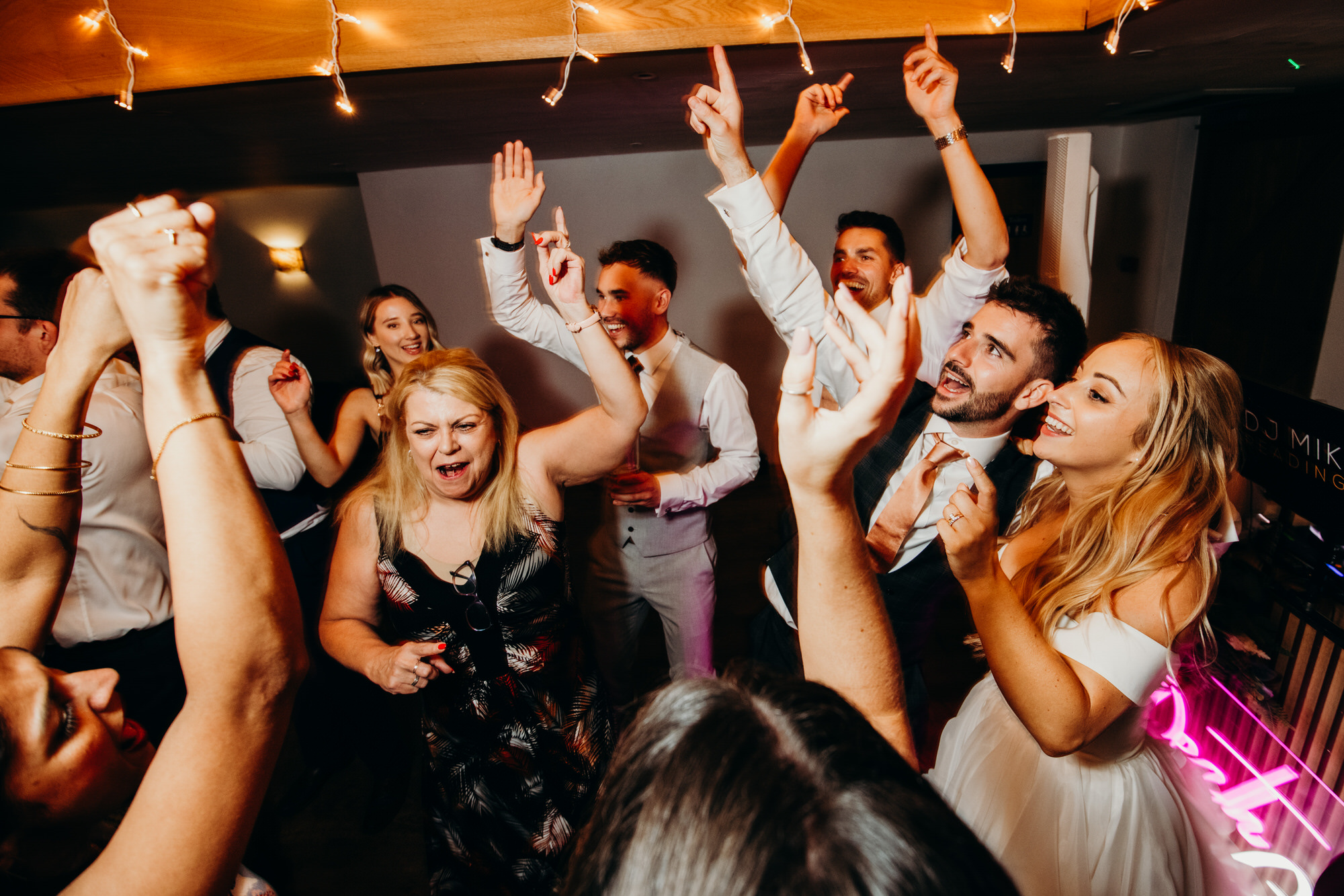 Hands in the air dancing at Bury Court wedding 