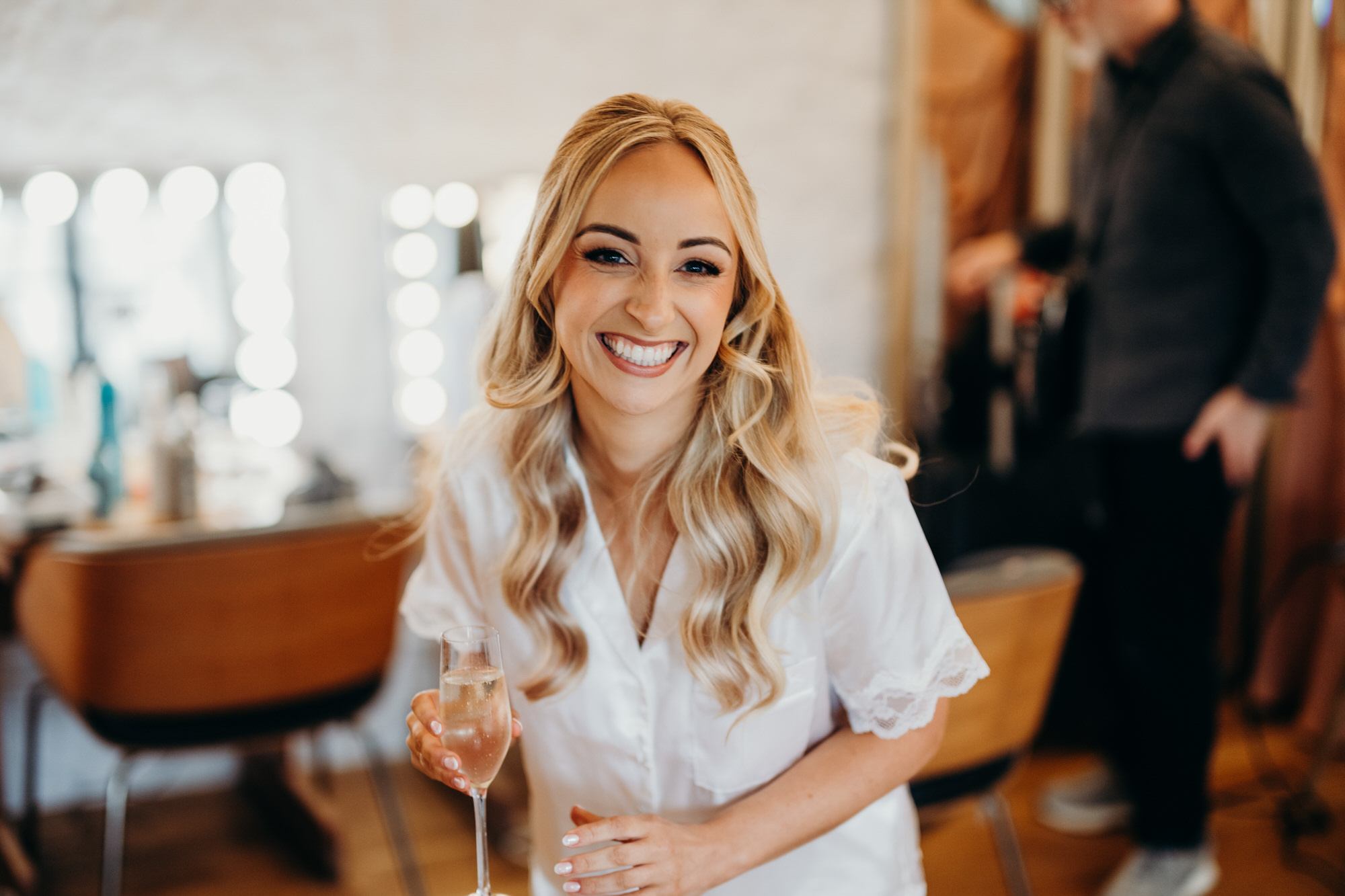 Bride laughing at Bury Court during prep